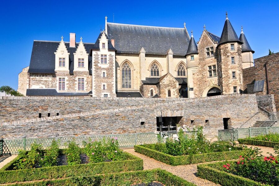 Angers: Château d'Angers Entrance Ticket - Traditional gardens and moats, where the castle becomes a place to breathe