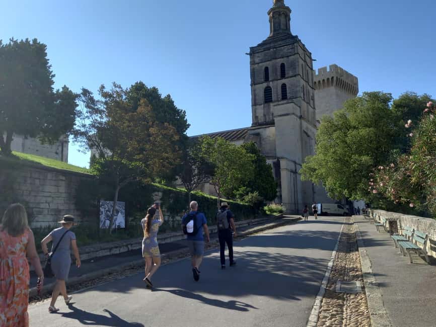 Avignon: City Walking Tour with Popes Palace Entry - Reaching the Pope’s Palace: Big Steps, Big Payoff