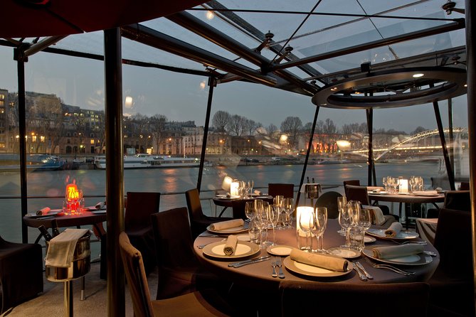 Bateaux Parisiens Seine River Gourmet Dinner & Sightseeing Cruise - Music and the dinner room vibe