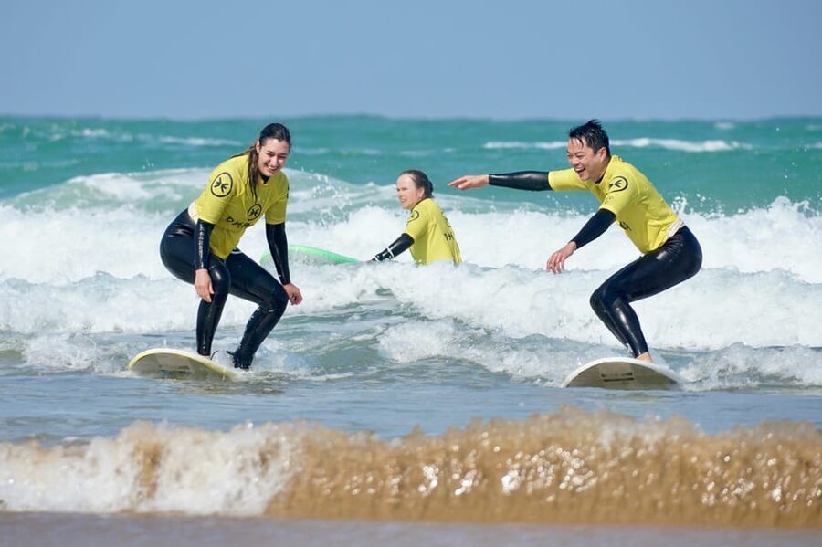 Biarritz: 1.5-Hour Group Surf Lesson - What happens before you paddle out: warm-up, board basics, then beach practice