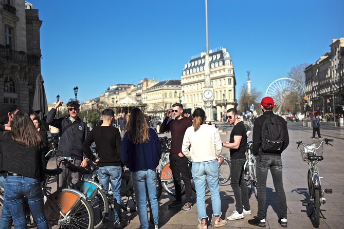 "Bordeaux by bicycle: a 3-hour tour immersive experience" - Tribunal Judiciaire, Grosse Cloche, and Basilique Saint-Michel