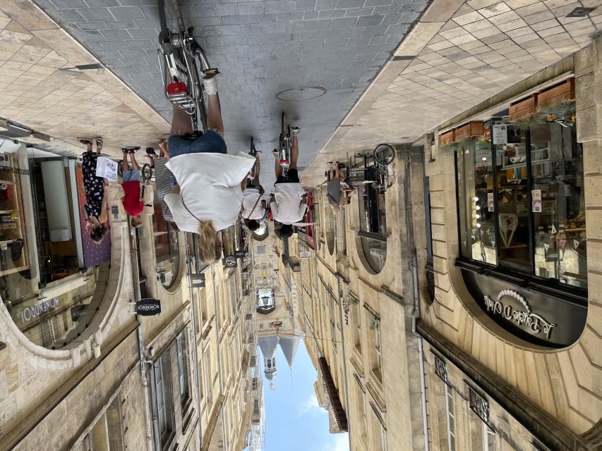 Bordeaux: Historic Center & Chartrons District Bike Tour - Crossing the Garonne: Pont de Pierre to the Chaban bridge views
