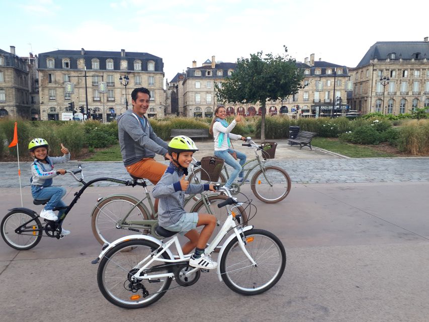 Bordeaux: Top Landmarks & Historic Bike Tour - Notre Dame Street to the Jardin Public: cobbles, cafés, and a local specialty
