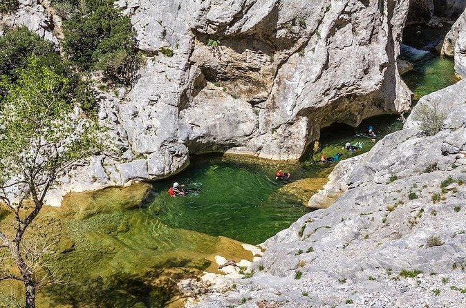 Canyoning descent of the Galamus Gorge - Inside Galamus: river walking, toboggans, and turquoise pools