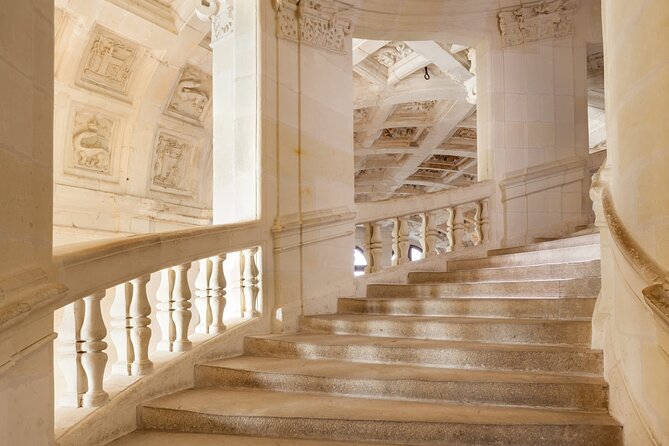 Day Tour of Chateaux of Chenonceau, Chambord & Caves Ambacia from Tours/Amboise - Chateau de Chambord, François I, 426 rooms, and a famous staircase