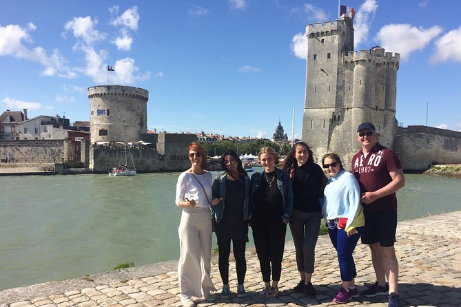 Discover La Rochelle: Discovery Walking Tour of La Rochelle - Porte de la Grosse-Horloge and the Trade-and-Walls Story