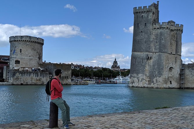Discover La Rochelle: Discovery Walking Tour of La Rochelle - Eglise St-Sauveur, Iconoclastic Wars, and the Guingette Moment