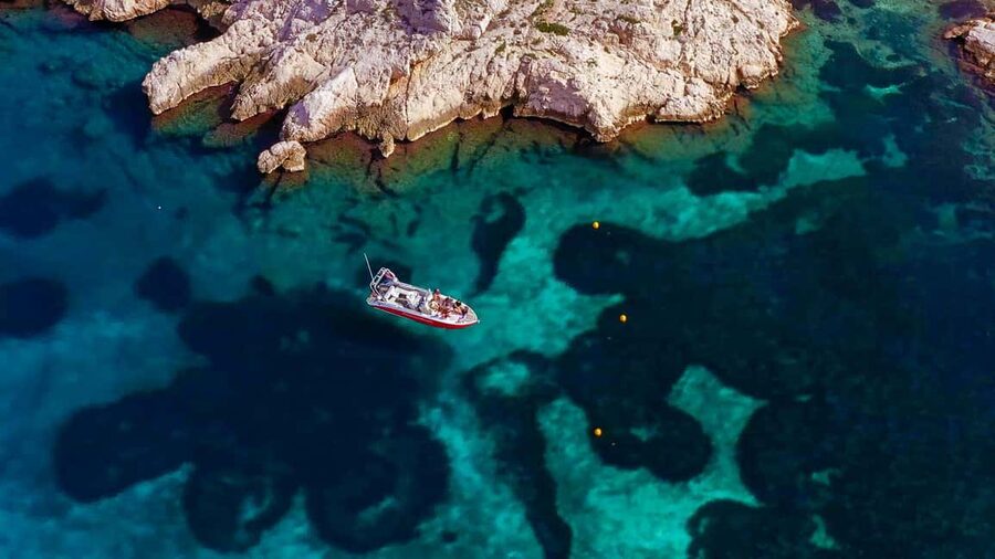 From Marseille: Iconic Calanques Boat Tour with Swimming - Blue Cave Plus the Classic Calanques: What Changes by Morning vs Afternoon