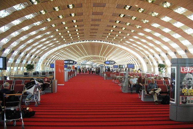 From Paris to CDG airport or From CDG airport to Paris (one way) - Meeting Your Chauffeur at CDG Arrivals (Name Board Included)