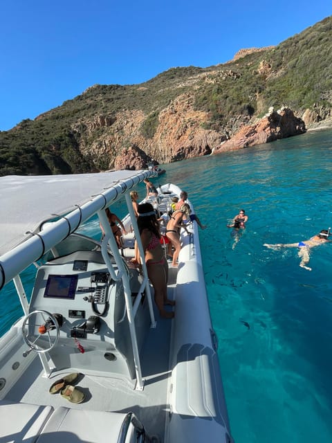 From Sagone/Cargèse: Scandola and Calanques de Piana Cruise - Calanques de Piana and Capo Rosso: red cliffs, caves, arch, and a swim