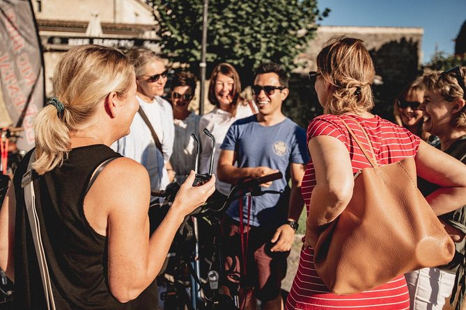 From Saint-Emilion : Electric Bike Day Tour with Wine Tastings and Picnic Lunch - Back to Saint-Emilion: Guided UNESCO Village Walk and Final Wine Session