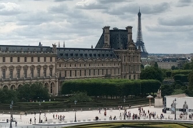 Guided tour of the Louvre Museum with tickets included - Meeting at Le Café Marly, then straight into the Louvre machine