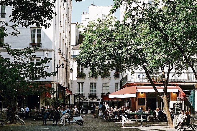 Le Marais District & Jewish Quarter Guided Walking Tour 12ppl Max - Value, pacing, and what to bring for rain or shine
