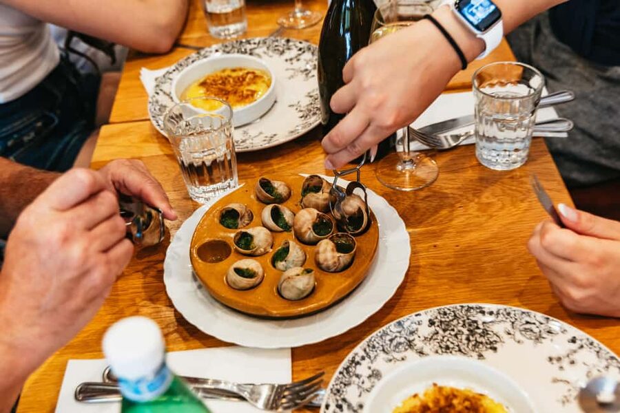 Le Marais Walking Food Tour with Cheese, Wine & Pastries - Chocolate, cured meats, pastries, and the restaurant stop where it gets real