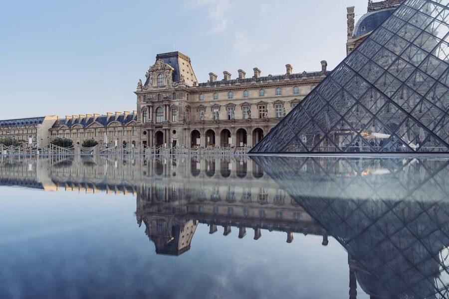 Louvre & Mona Lisa Small Group Tour with Reserved Entry - The Louvre building itself: from palace foundations to royal symbols