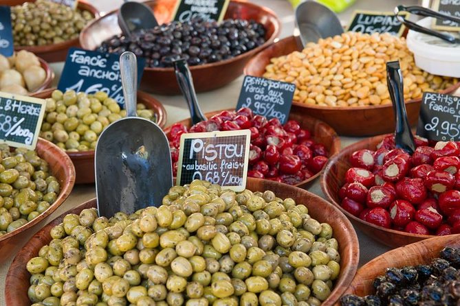 Luberon Market & Villages Day Trip from Aix-en-Provence - Ansouis: calmer village feel, Sunday market focus