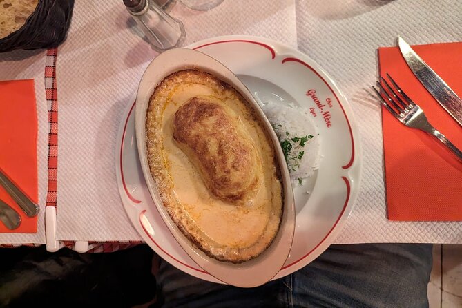 Lyon Sunset Food Tour – A Full Taste of France by Do Eat Better - Pont Alphonse Juin: herbal liqueur at the end of the walk