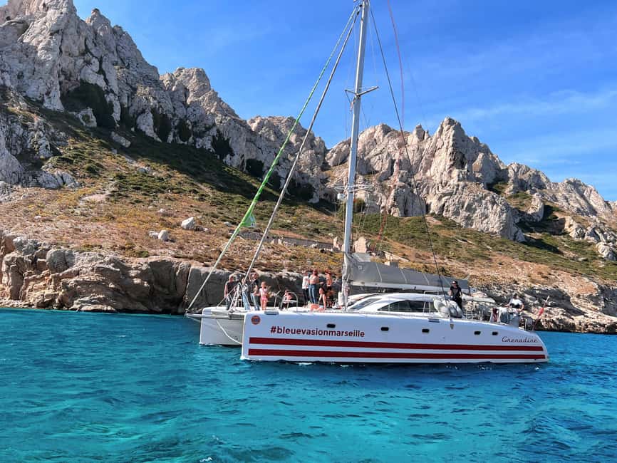 Marseille: Calanques Catamaran Cruise, Picnic, & Swimming - Snorkeling gear, wetsuits, and what you might see under the surface