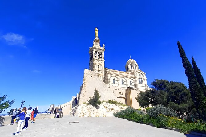 Marseille Guided Tour for 4 Hours with a Bilingual Local Guide - Notre-Dame de la Garde: the hilltop payoff