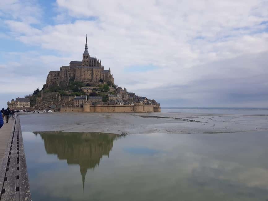 Mont Saint Michel: Village History and Legends Walking Tour - The core experience: a guided village walk built around the Abbey