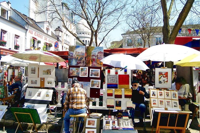 Montmartre District and Sacre Coeur - Exclusive Guided Walking Tour - Dalida, wild plants, and the last vines: Montmartre beyond the postcard line