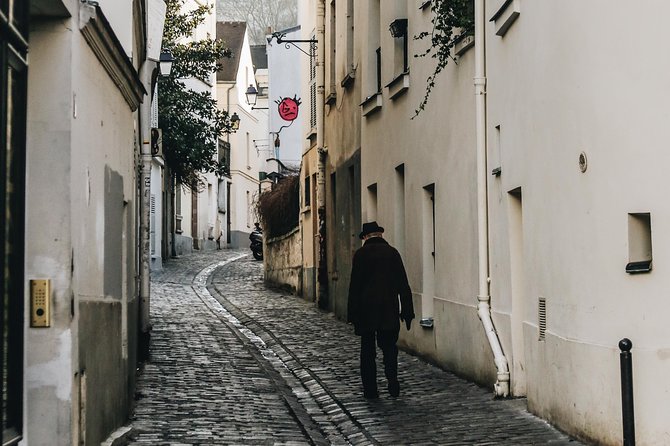Montmartre District Walking Tour in Paris - Vigne du Clos Montmartre: the last authentic vineyard