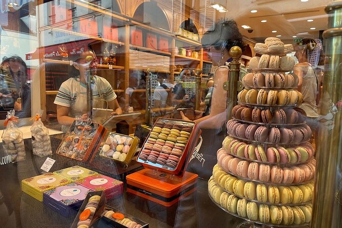 Montmartre Hill French Gourmet Food and Wine Tasting Walking Tour - Eight tasting venues: cheeses, cured meats, macarons, chocolate, and the wine pairing
