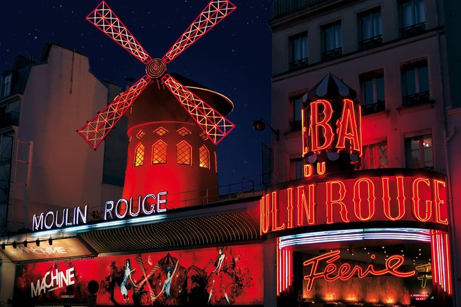Moulin Rouge Dinner Show with Champagne and Drop Off - Feerie Show Breakdown: Can-Can Energy, Moving Stairs, and a Giant Aquarium