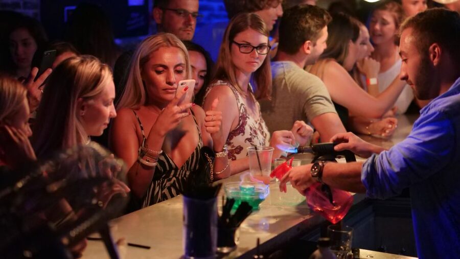 Nice: Ultimate Party Bar Crawl Free Shots & VIP Club Entry - Old Town Nice, 5 hours, and a crew in red