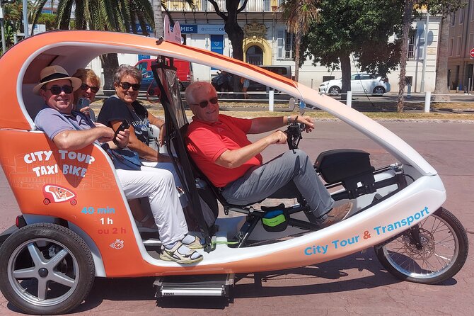 Nice: Visit of Nice by electrically assisted bike taxi 1 hour. - Cours Saleya flower market: colors, scents, and Niçois snack choices
