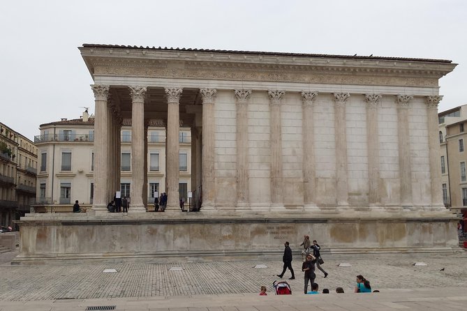 Nimes, Uzes & Pont du Gard Small Group FULL DAY Tour from Avignon - Arenes de Nîmes: the Roman amphitheatre that kept changing