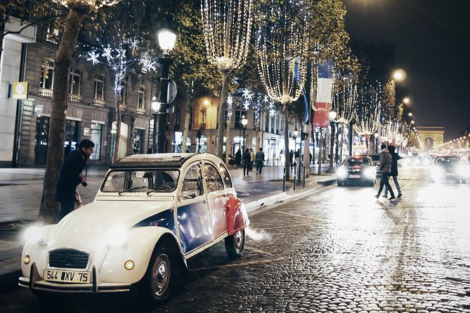 Paris and Montmartre 2CV Tour by Night with Champagne - Paris After Dark in a Citroën 2CV, With Champagne Included