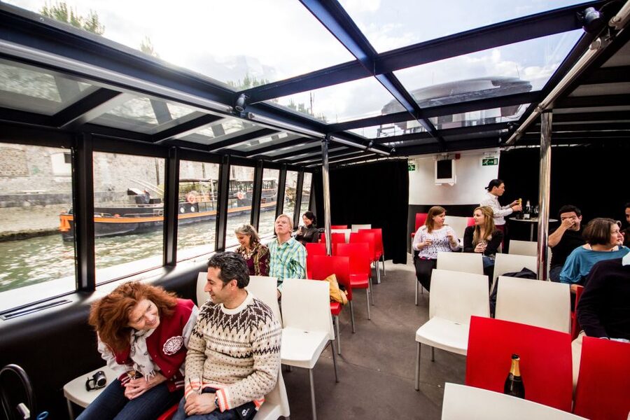 Paris: Champagne Tasting Cruise Departure from Eiffel Tower - Comfort and views: private front salon, all-glass windows, and a deck for photos