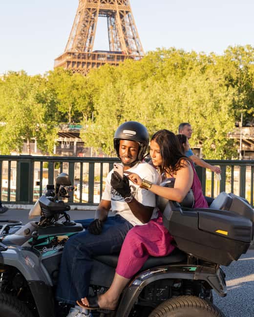 Paris: City Highlights Guided Quad Tour - First Arrondissement cruising for quick orientation and street-level photos