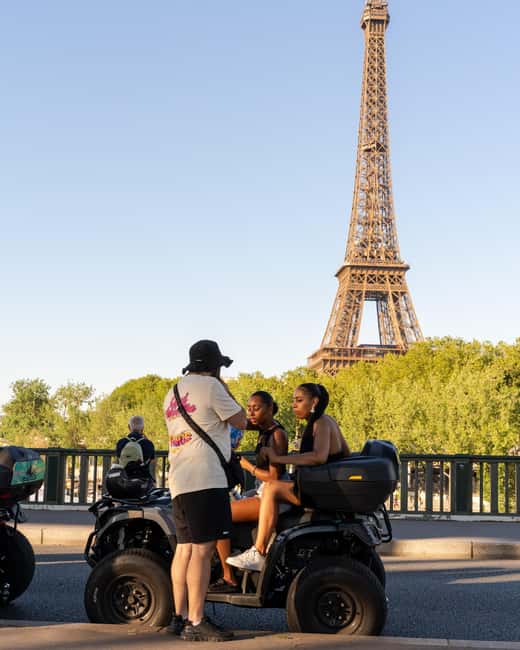 Paris: City Highlights Guided Quad Tour - Arc de Triomphe and the thrill of seeing it from street motion