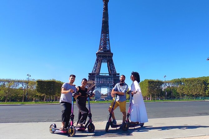 Paris City Tour by E-Scooter with Fun Guide (Small groups) - Louvre Museum frontage and Cour Carrée: seeing power from the inside edge
