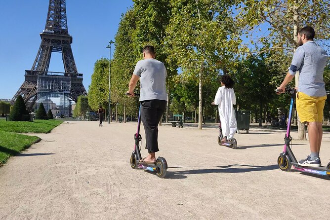 Paris City Tour by E-Scooter with Fun Guide (Small groups) - Seine stroll, National Assembly, Pont Alexandre III, and Musee dOrsay views