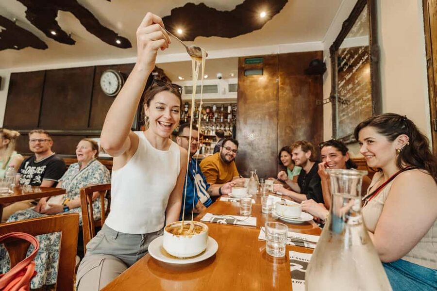 Paris Culinary Tour: 11 Tastings & 2 Wines in Le Marais - Moroccan crepes at an old covered market, with the story attached