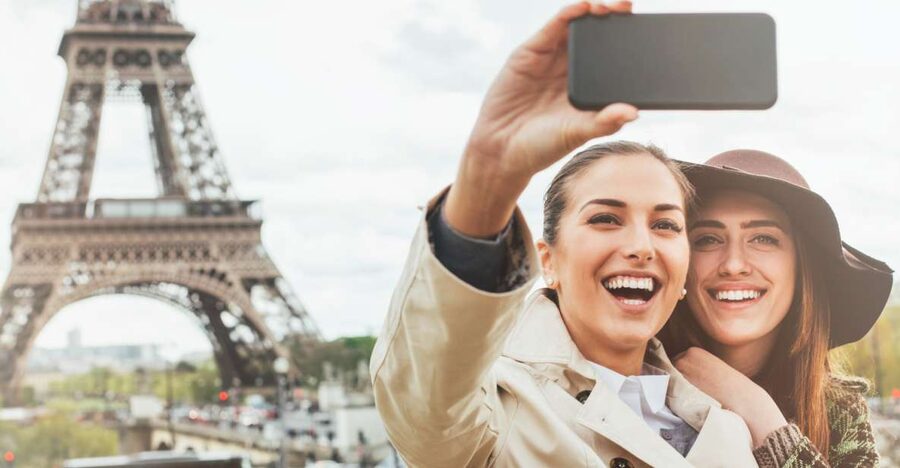 Paris: Eiffel Tower Hosted Tour, Seine Cruise and City Tour - The Seine cruise on a glass-enclosed trimaran, with 13-language commentary