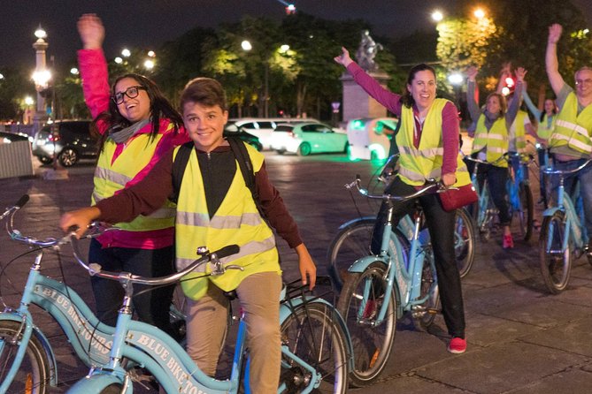 Paris Evening Bike Tour with 1-hour Seine River Cruise - Pont Neuf, old stone faces, and a legend-style explanation