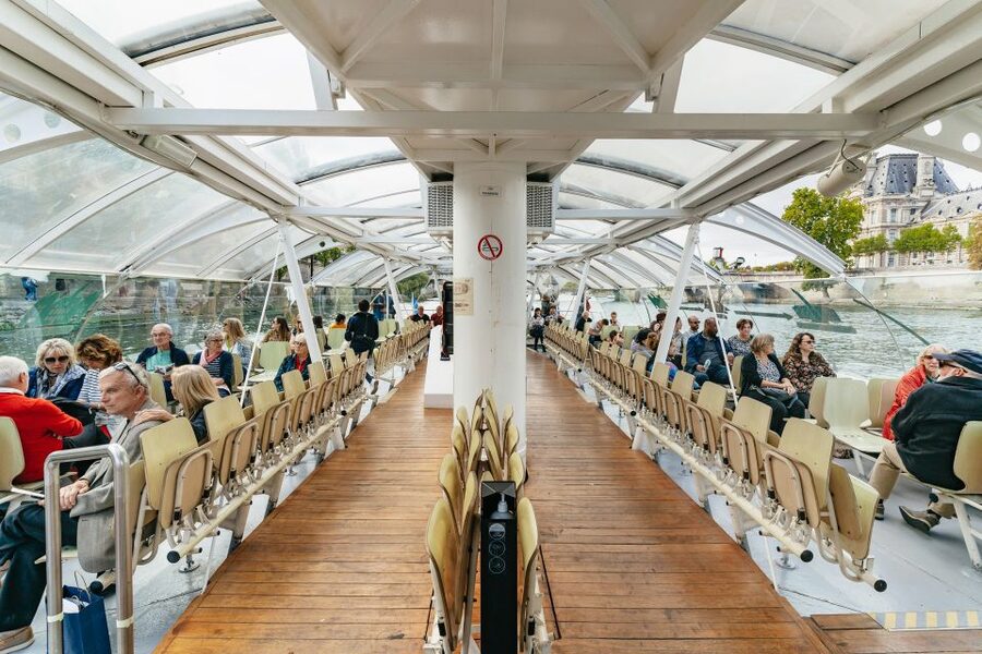 Paris: Hop-On Hop-Off Seine Cruise Pass with 9 Stops - The boat experience: heated comfort, terrace photos, and real-world visibility