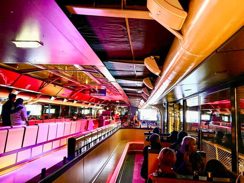 Paris: Illuminated Evening River Cruise & Waffle Tasting - Audio Guides and the Onboard Music Mood on Deck