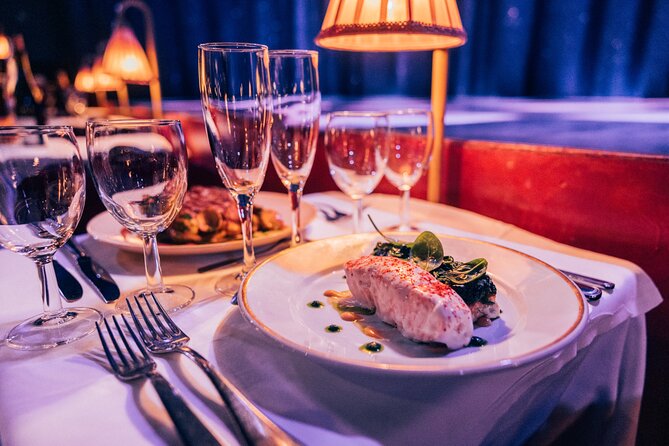 Paris La Nouvelle Eve Cabaret Show in Montmartre - Champagne during the show, or dinner first with wine