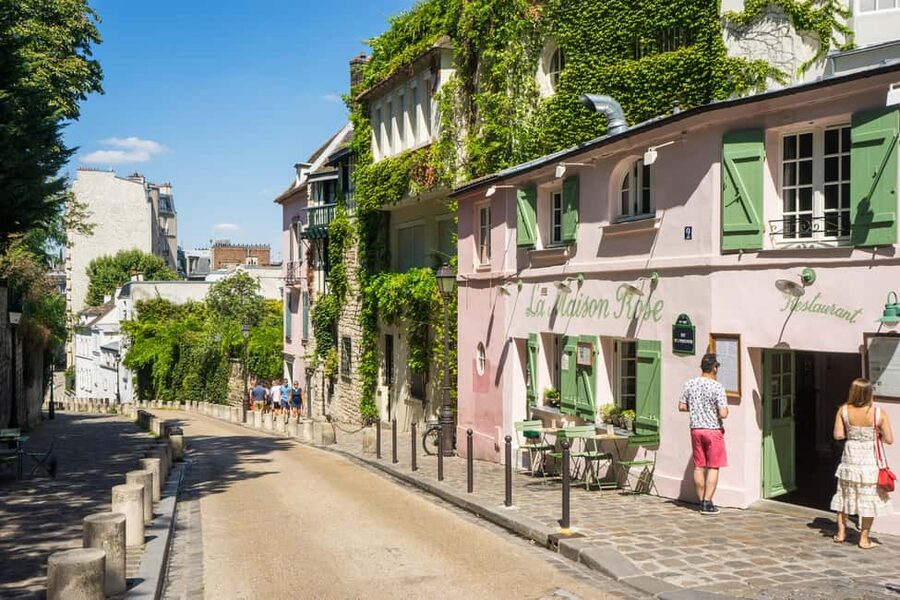 Paris Montmartre: 2-Hour City Tour in German - Moulin de la Galette, Where the Hill Starts to Make Sense