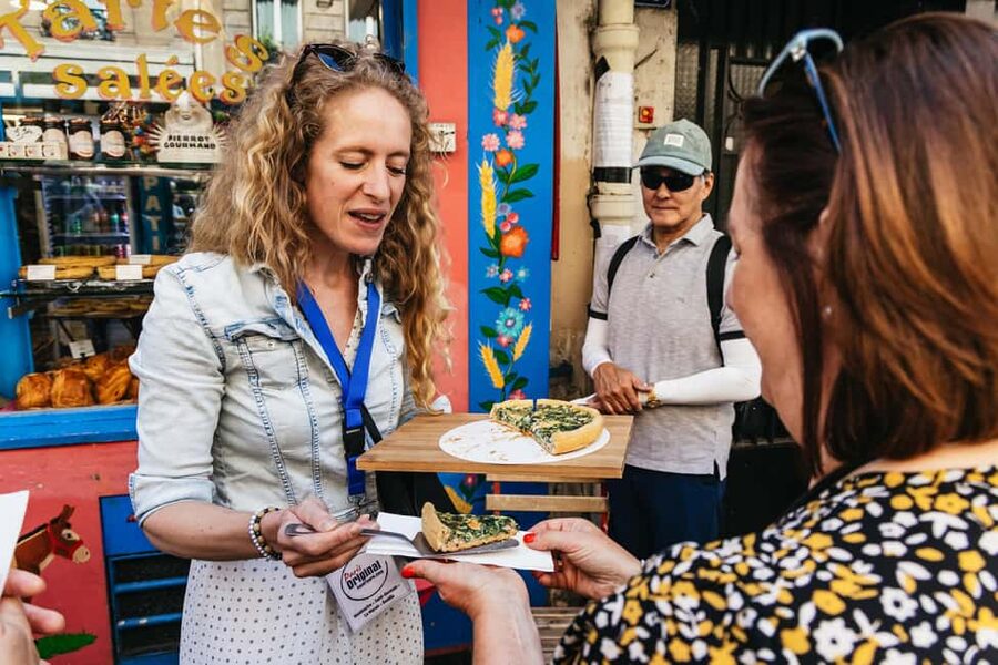 Paris: Montmartre Cheese, Wine & Pastry Guided Walking Tour - Place du Tertre and Moulin Rouge: seeing the “stage set” for real