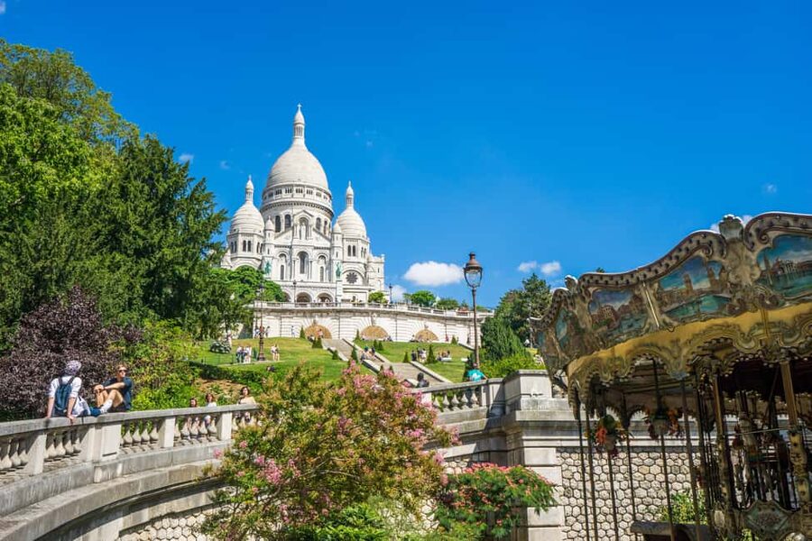 Paris: Montmartre Group Tour in German - Moulin de la Galette and the walk up the hill you feel in your legs