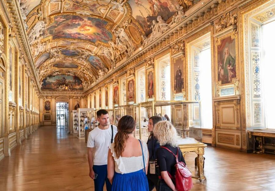 Paris: Montmartre, Notre-Dame, & Louvre Tour with Cruise - Eiffel Tower exterior stop: photos with the story behind the iron