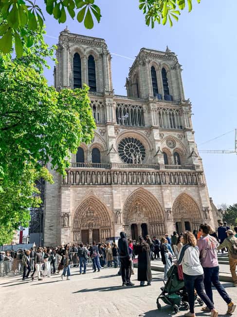 Paris: Notre Dame Cathedral Tour & Seine River Cruise - Meet at 61 Quai de la Tournelle, then get oriented fast