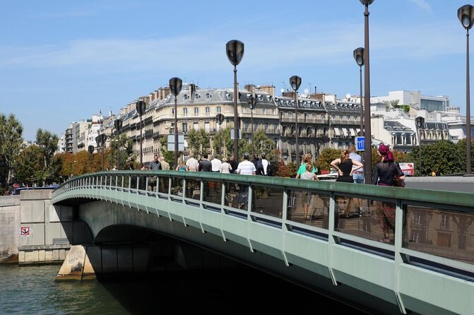 Paris Renew Your Wedding Vows Experience with Professional Photographer - Meeting at the Eiffel Tower Entrance 2, Left Side