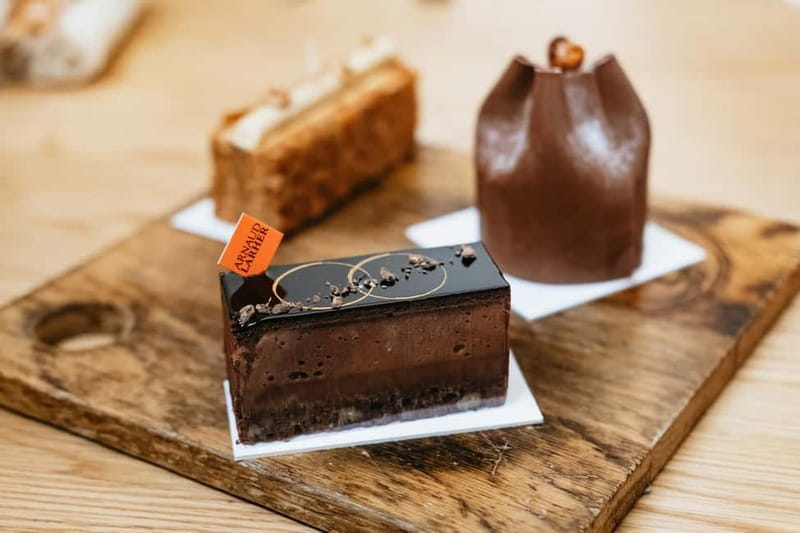Paris: Saint Germain des Prés Guided Foodie Walking Tour - Hidden courtyard detours and lesser-known streets that feel truly local